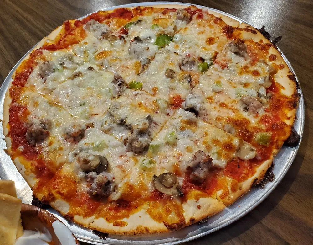 Sausage Onions Green Peppers and Mushroom Pizza